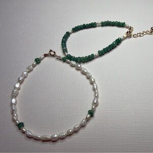 Raw natural emerald and baroque pearl bracelets